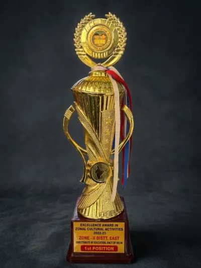 Tall gold trophy with Directorate of Education medallion, Excellence Award 2022-23 1st Position